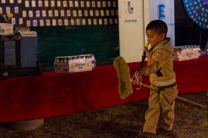 A Little Boy Playing With a Broom at Sayulita Days