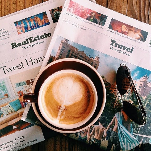The Travel Section of the New York Times and a Cappuccino - Treat Everyday as a Vacation When You Travel and Work Full Time