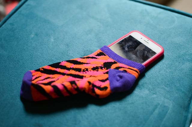 Use your socks to protect your electronics and you will find out why they are one of our essential travel items