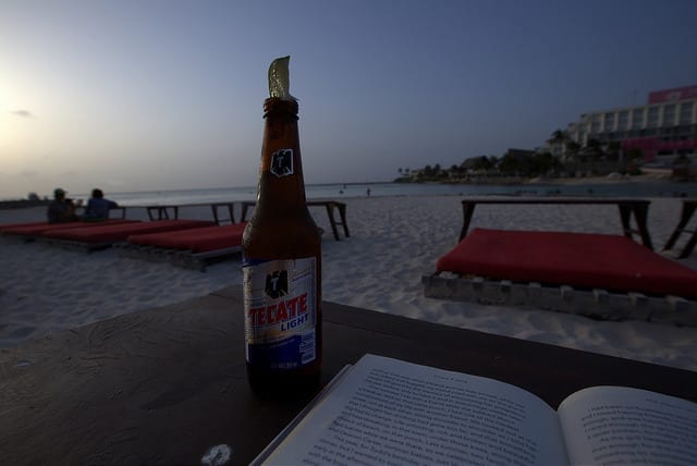 A Tecate Light Beer with a Lime on the Beach - How to Travel Slow on a Short Trip