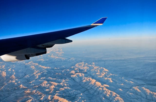 View of the Mountains from Out An Airplane Window - How to Survive a Long Flight