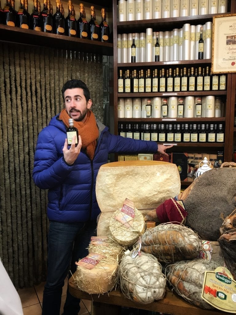 Mattia from Delicious Bologna Showing Us a Bottle of Traditional Balsamic